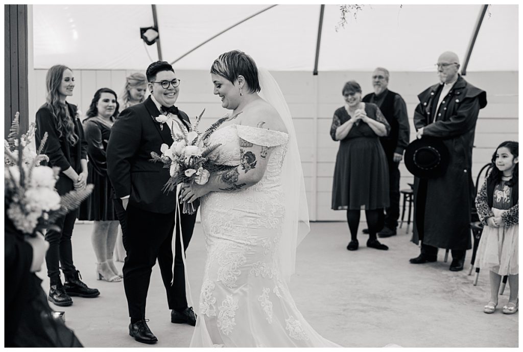 bride reaches altar at ceremony by Ellie Chavez Photography