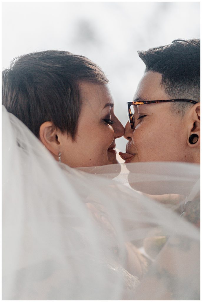 partner sticks out tongue by Austin wedding photographer