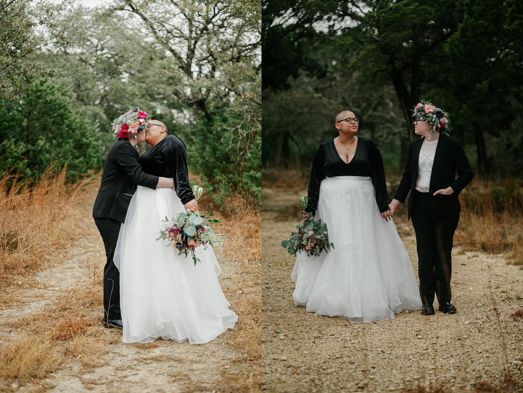 married couple stands on small path kissing and holding hands by Austin Wedding Photographer