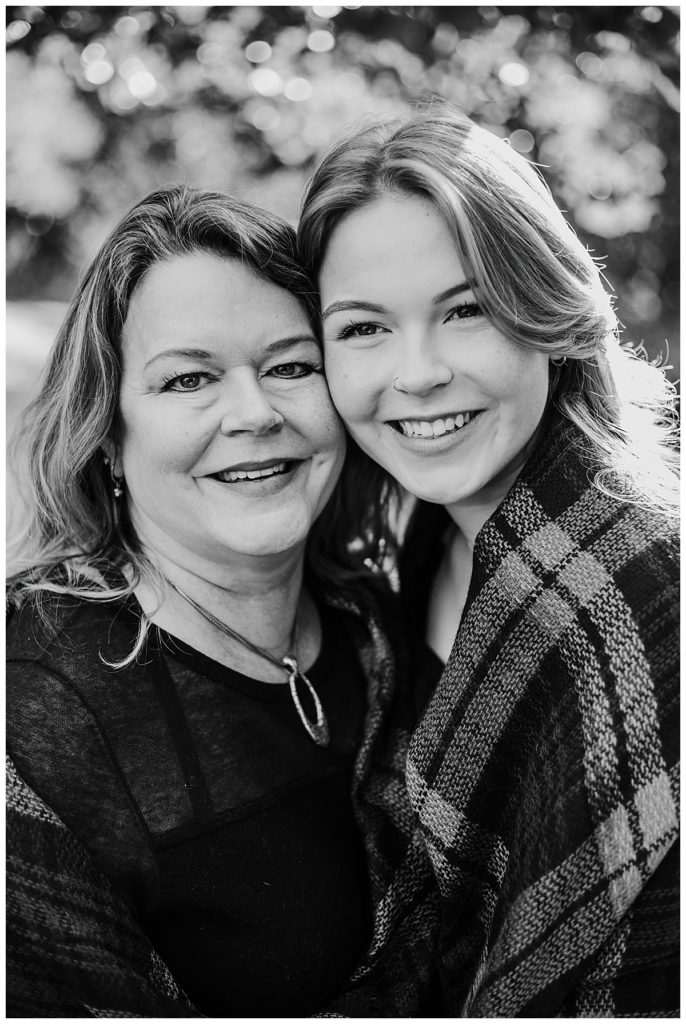 mom and daughter smile together for Austin portrait photographer