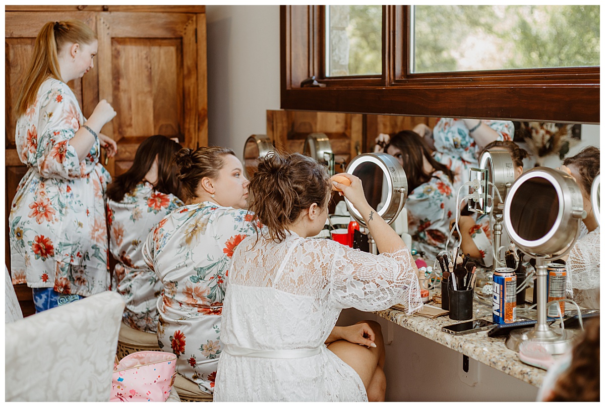 Bridesmaids get ready by Austin wedding photographer