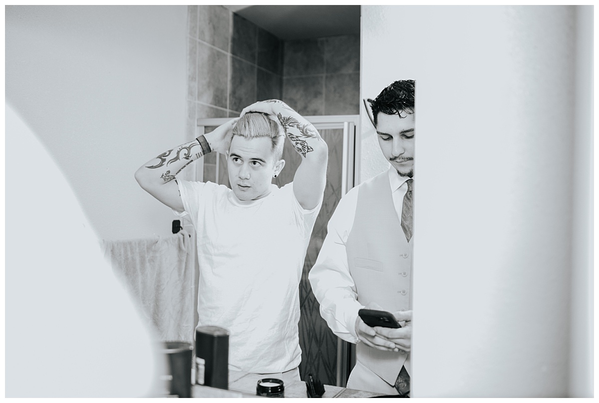 Groom and friend get ready by Ellie Chavez Photography 