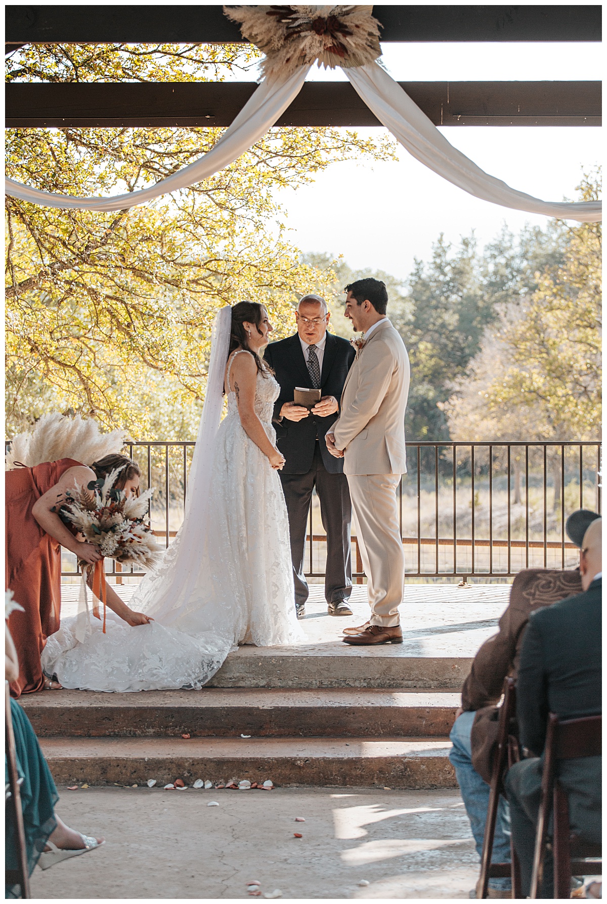 Couple stands at altar at Texas ranch ceremony