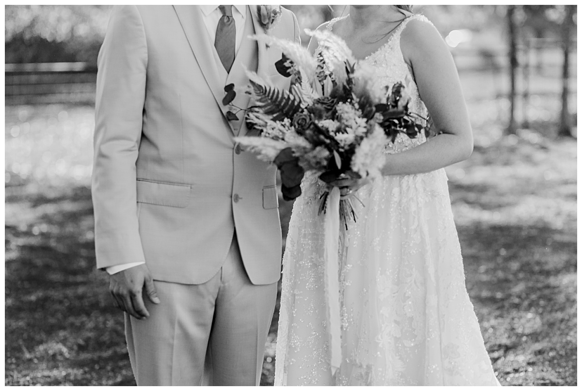 Bride and groom stand together at Texas ranch ceremony