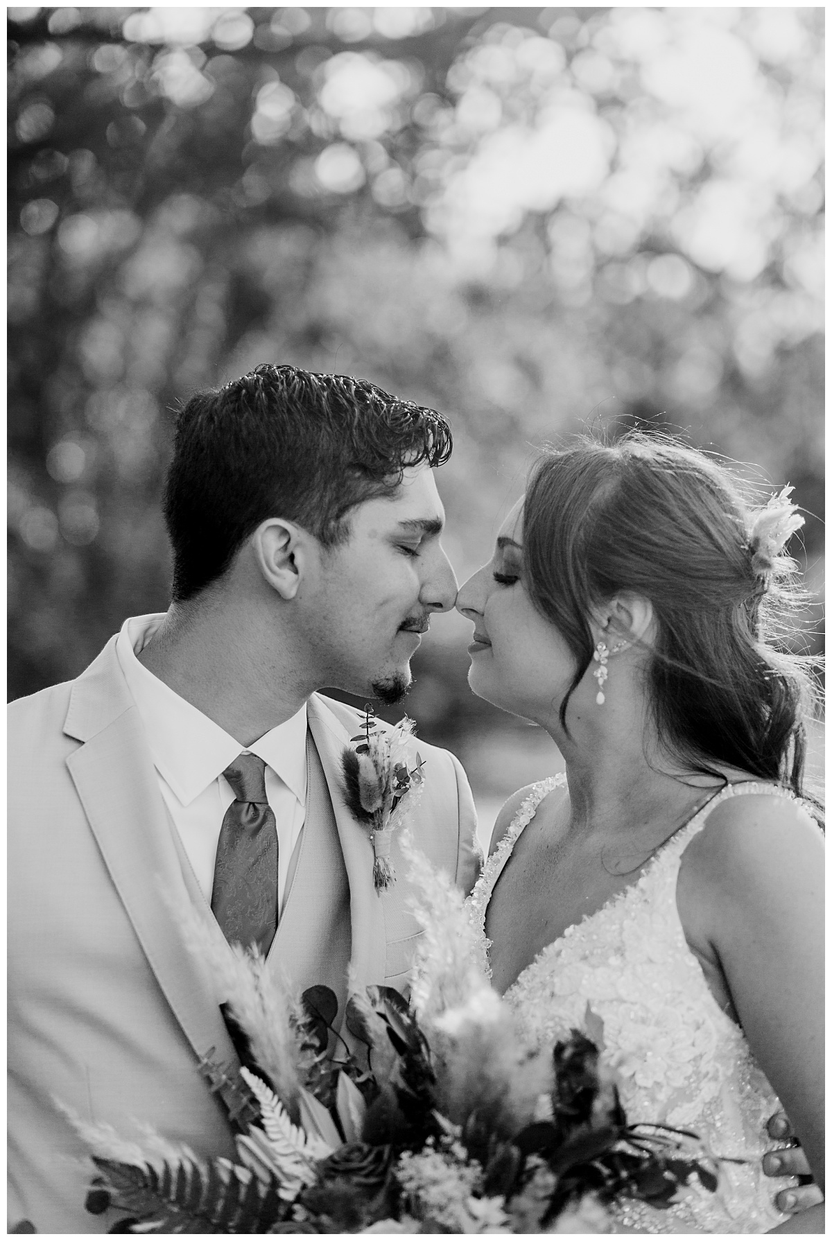 Couple touches noses by Ellie Chavez Photography 