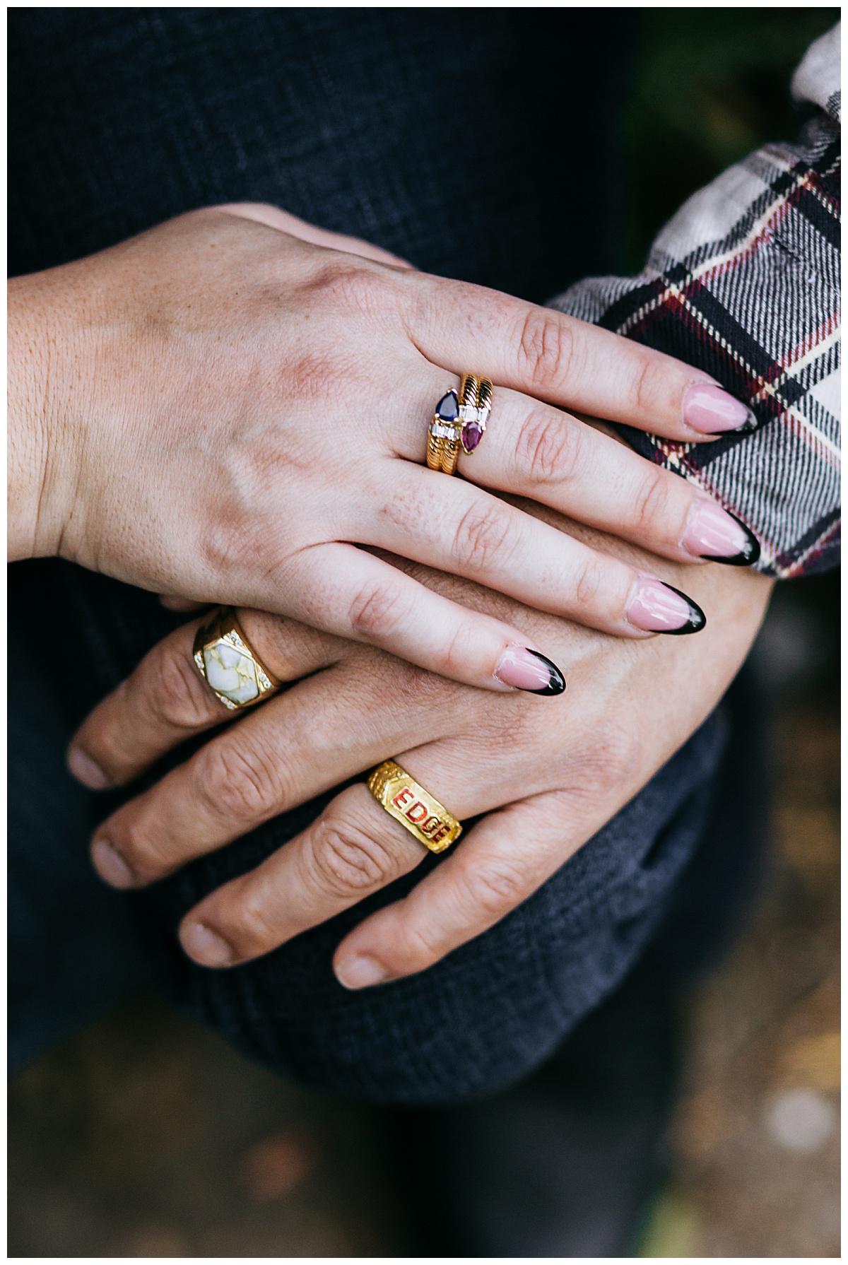 hands show off rings and manicure at St. Edwards Park engagement session