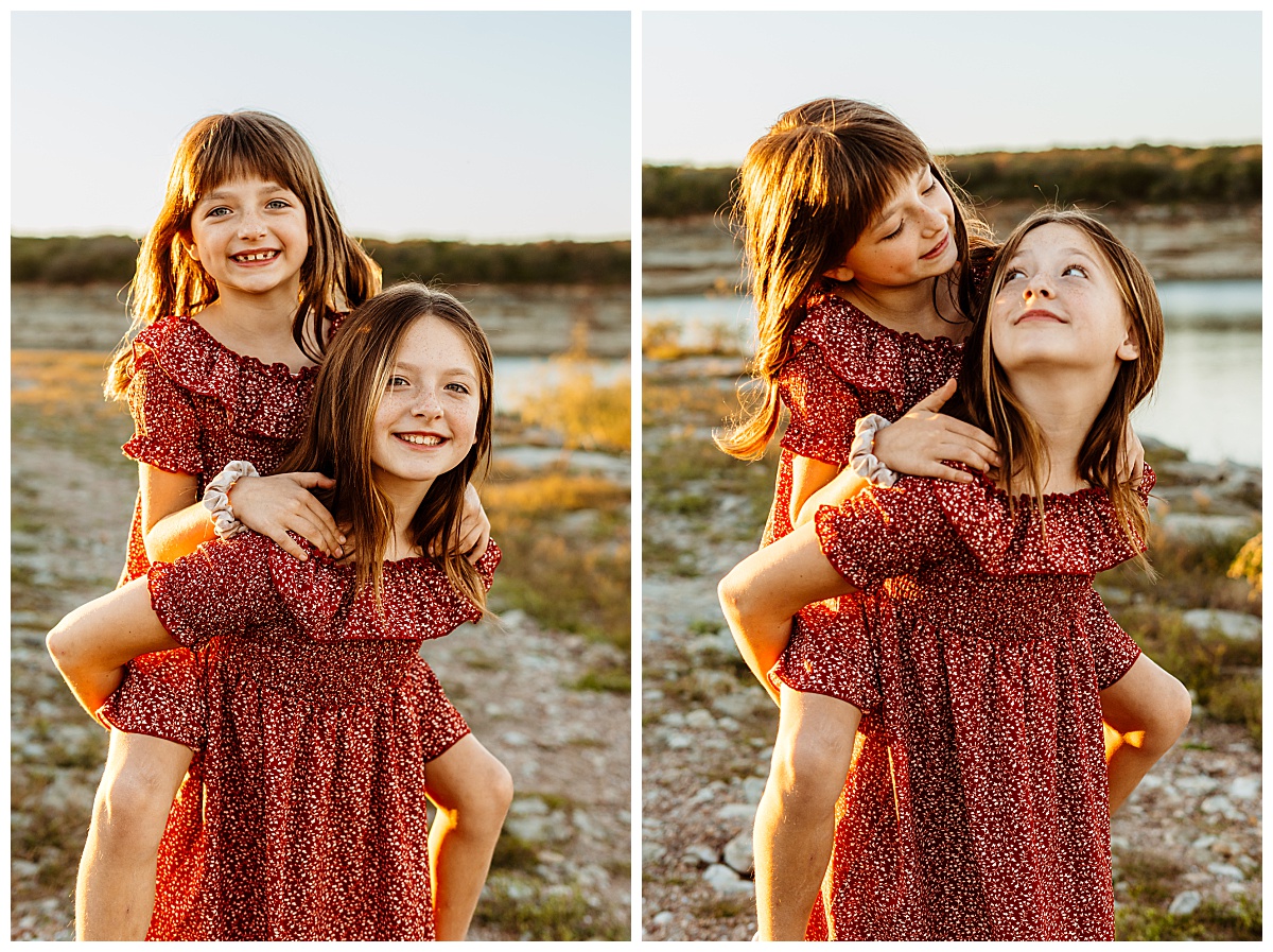 sisters smile at each other during piggy back ride at Lago Vista family session